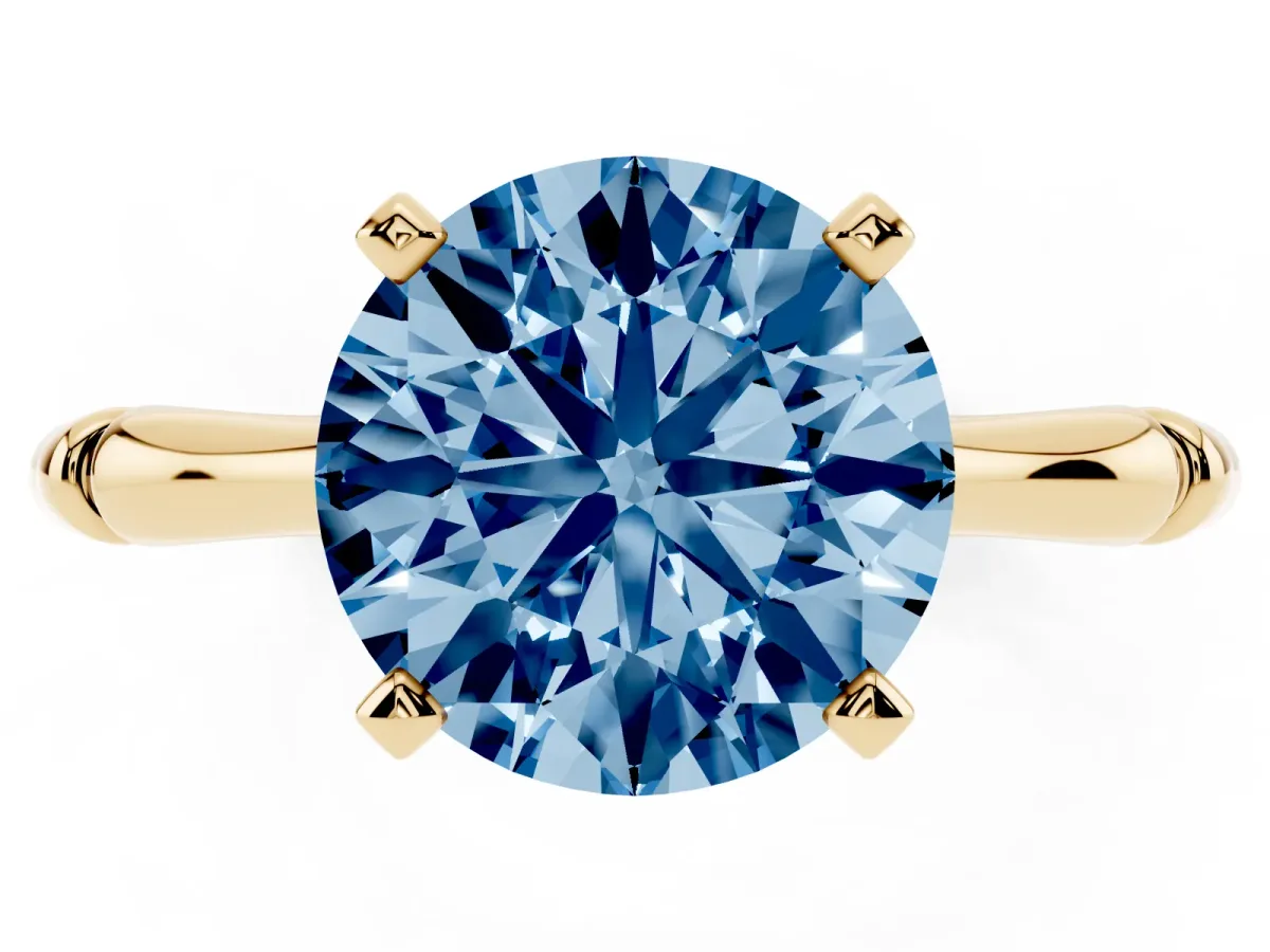 Fancy Blue Round Cut Solitaire Diamond Ring with Bamboo Band and Four-Prong Setting Yellow gold