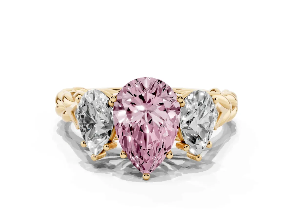 Fancy Pink Three-Stone Pear Cut Diamond Braided Band Ring with Four-Prong Setting Yellow gold