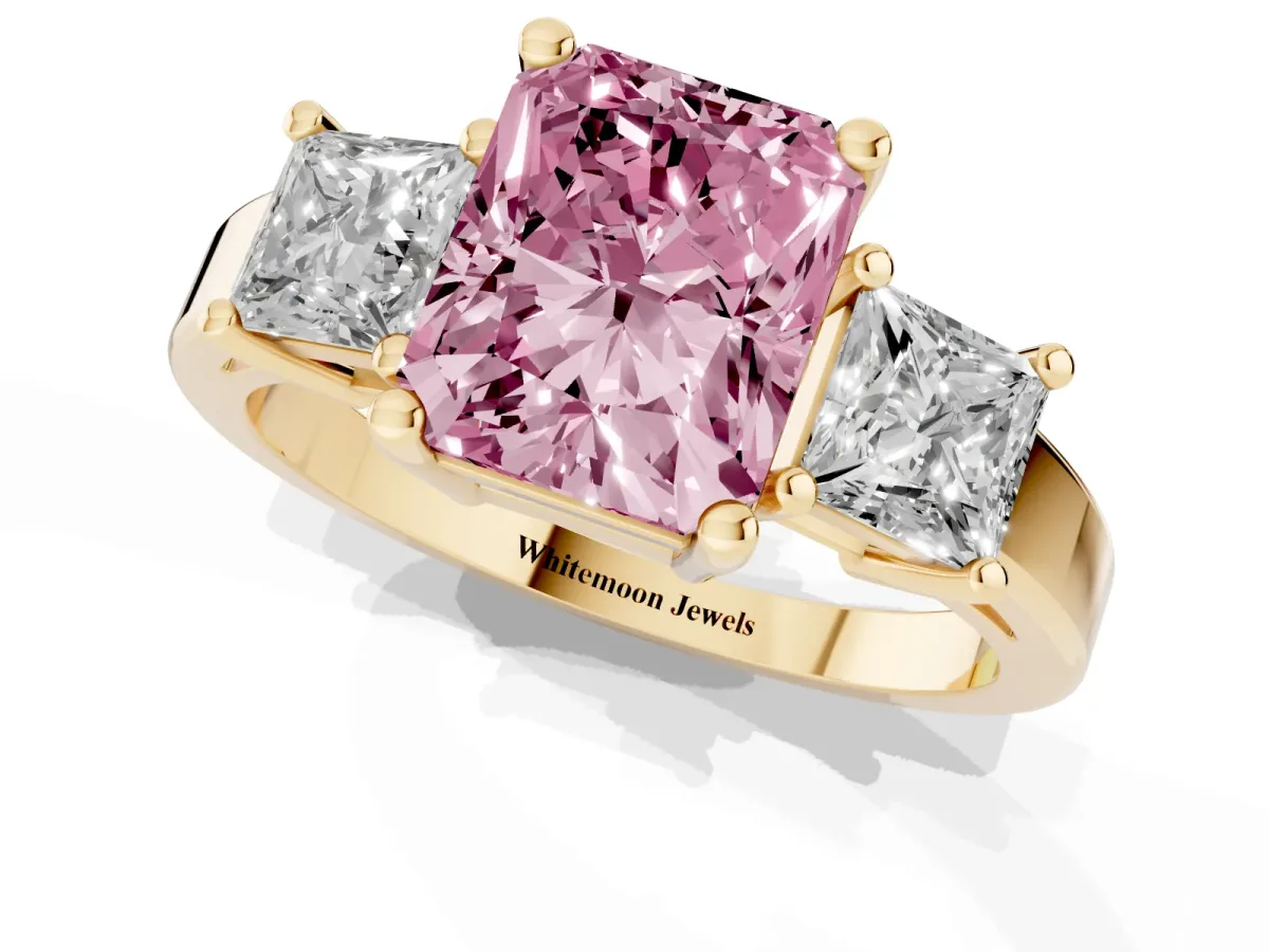Fancy Pink Three-Stone Radiant Cut Cut Solitaire Ring with Prong Setting Yellow gold