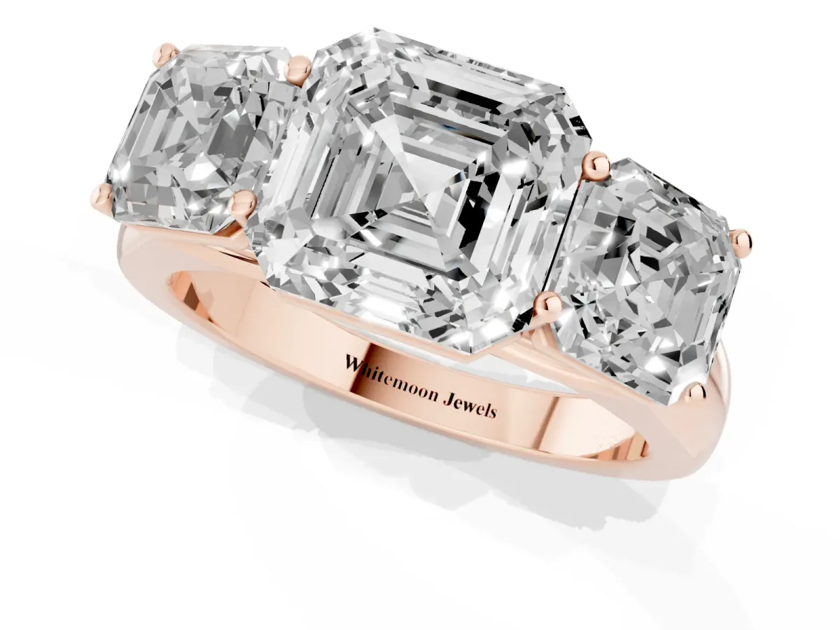 Asscher Cut Three-Stone Diamond Ring with Prong Setting on a Classic Band Rose gold