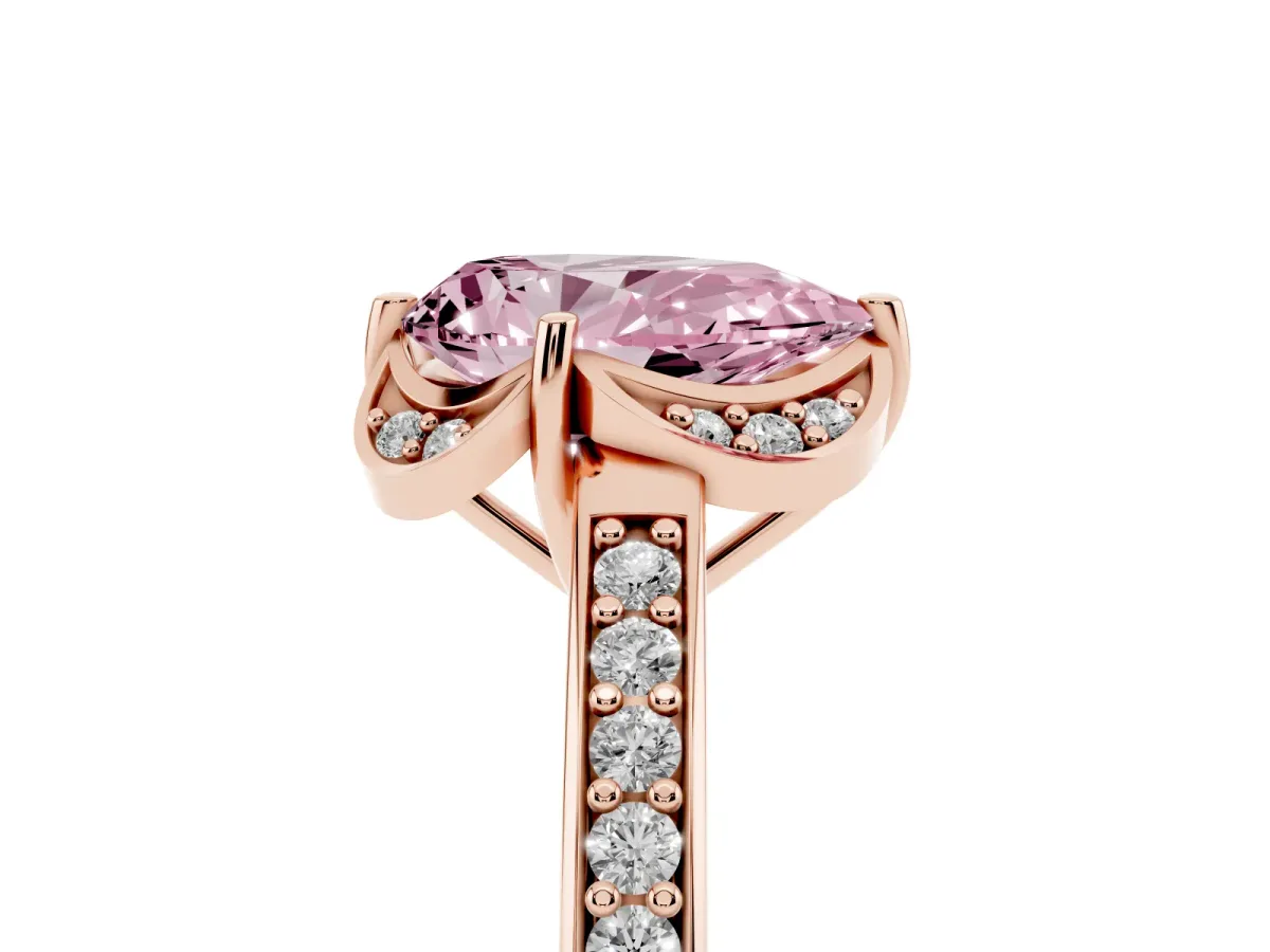 Fancy Pink Pear Cut Cut Halo Diamond Ring with Channel Set Band and Four-Prong Setting Rose gold
