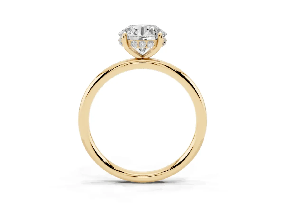 Round Cut Solitaire Diamond Ring with a Classic Band and Four-Prong Setting Yellow gold
