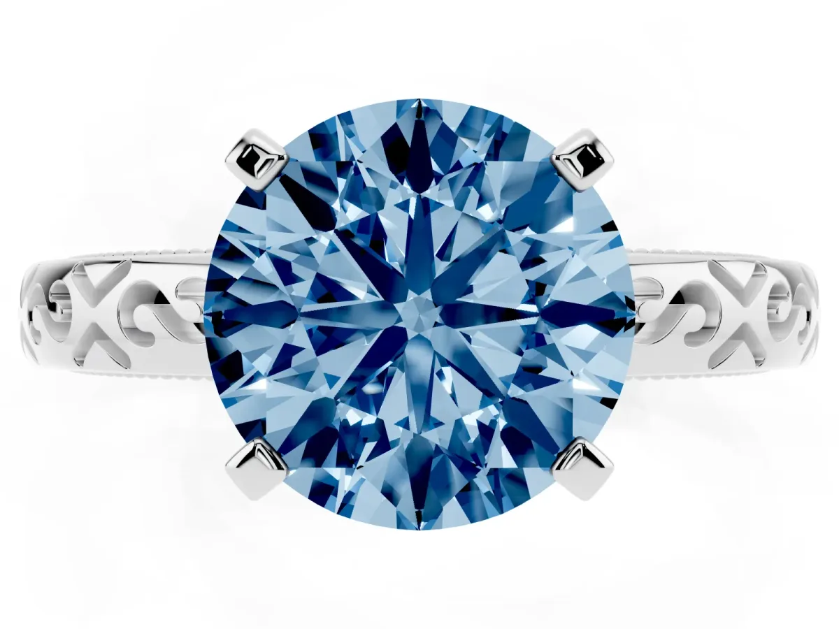 Fancy Blue Round Cut Solitaire Engagement Ring with Scrollwork Band and Four-Prong Setting Silver