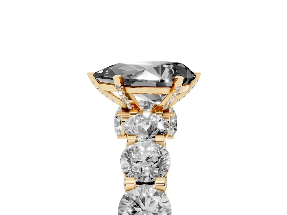 Fancy Black Pear Cut Diamond Side Stone Engagement Ring with Four-Prong Setting Yellow gold