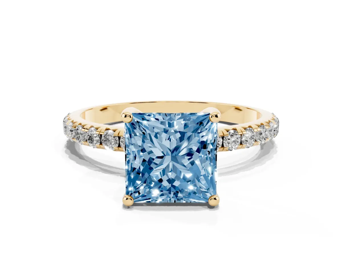 Fancy Blue Princess Cut Cut Diamond Solitaire Ring with Micro Pave Band and Four Prong Setting Yellow gold