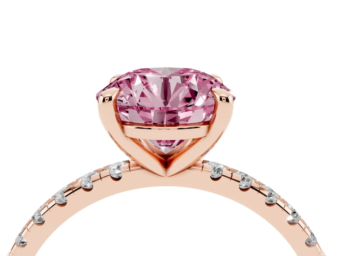 Fancy Pink Round Cut Diamond Brilliant Solitaire Ring with Pavé Band and Four-Prong Setting Rose gold