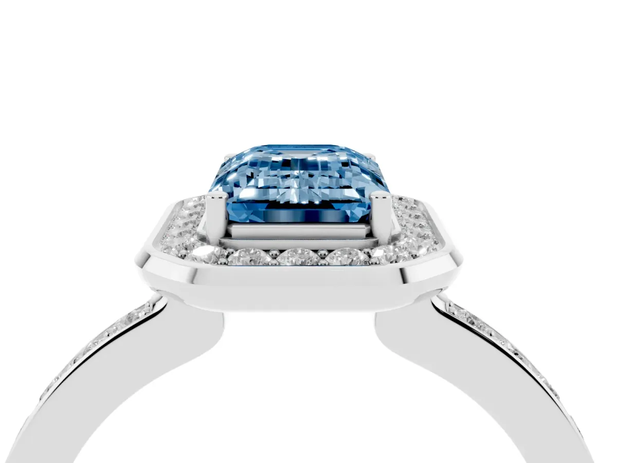 Fancy Blue Emerald Cut Diamond Halo Ring with Bezel Frame and Pavé Band Silver