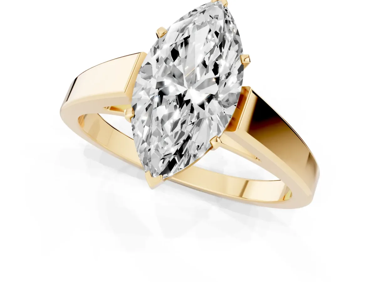 Marquise Cut Solitaire Engagement Ring with Four-Prong Setting and Tapered Band Yellow gold