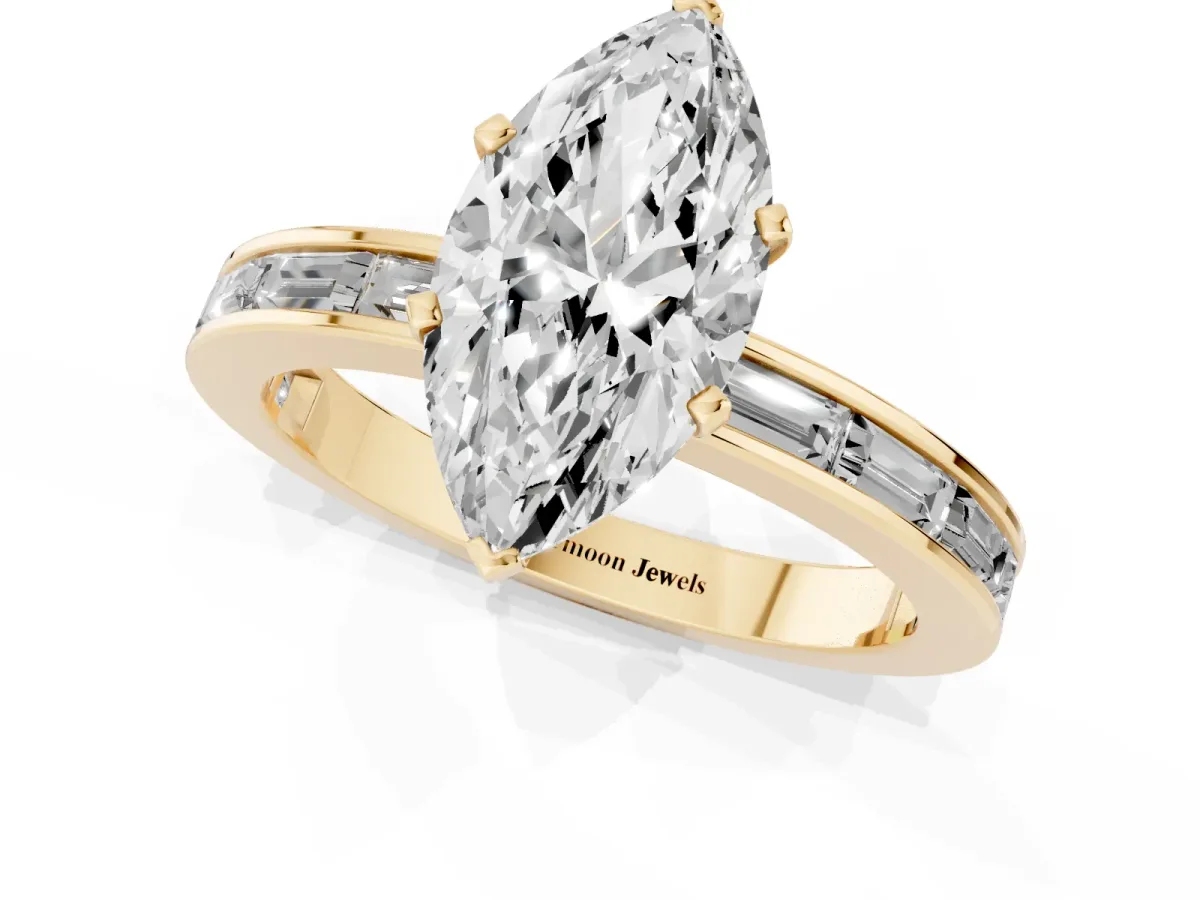 Marquise Cut Solitaire Diamond Ring with Channel-Set Baguette Band and Four-Prong Setting Yellow gold
