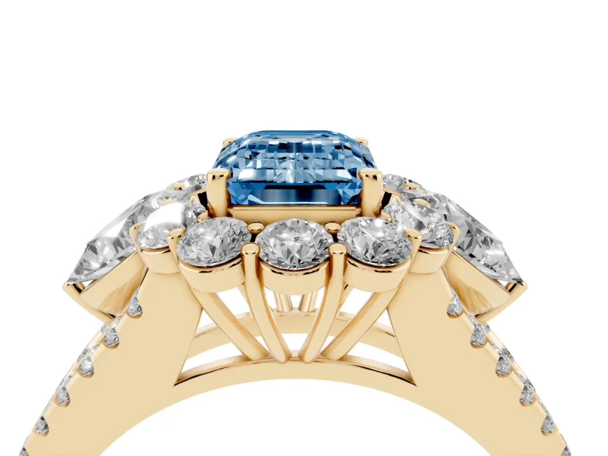 Fancy Blue Emerald Cut Halo Split Shank Diamond Engagement Ring with Prong Setting Yellow gold