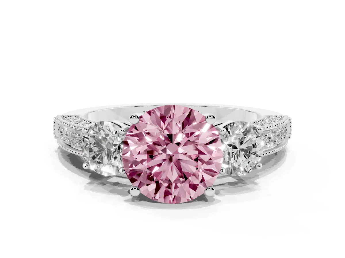 Fancy Pink Round Cut Three-Stone Diamond Ring with Pavé Band and Four-Prong Setting Silver