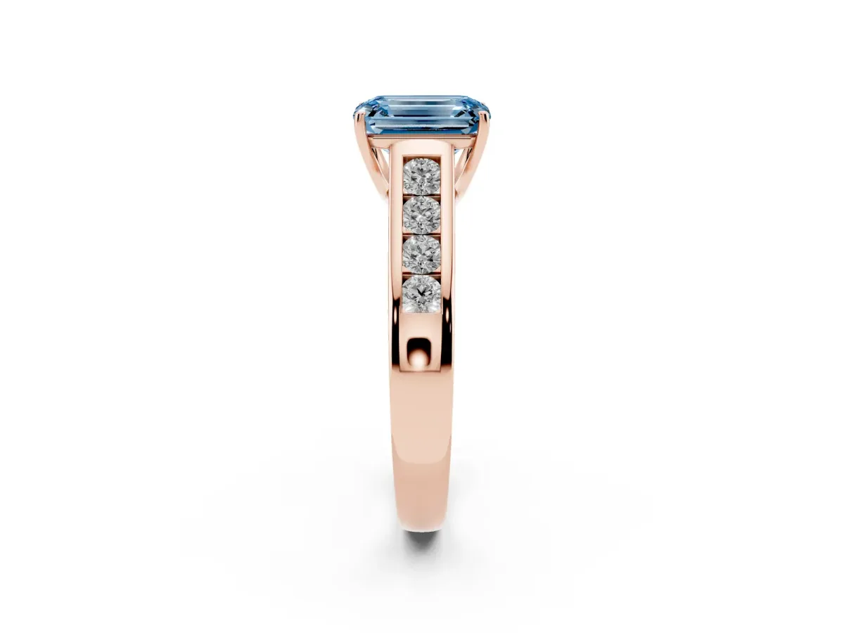 Fancy Blue Emerald Cut Brilliant Channel-Set Solitaire Ring with Four-Prong Setting Rose gold