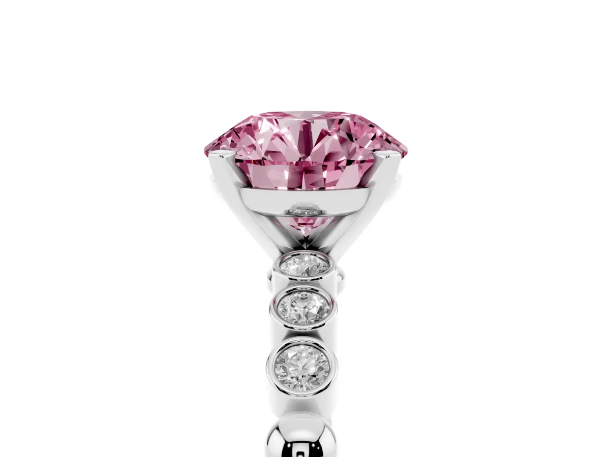 Fancy Pink Round Cut Solitaire Bezel Accent Diamond Engagement Ring with Beaded Band and Four-Prong Setting Platinum