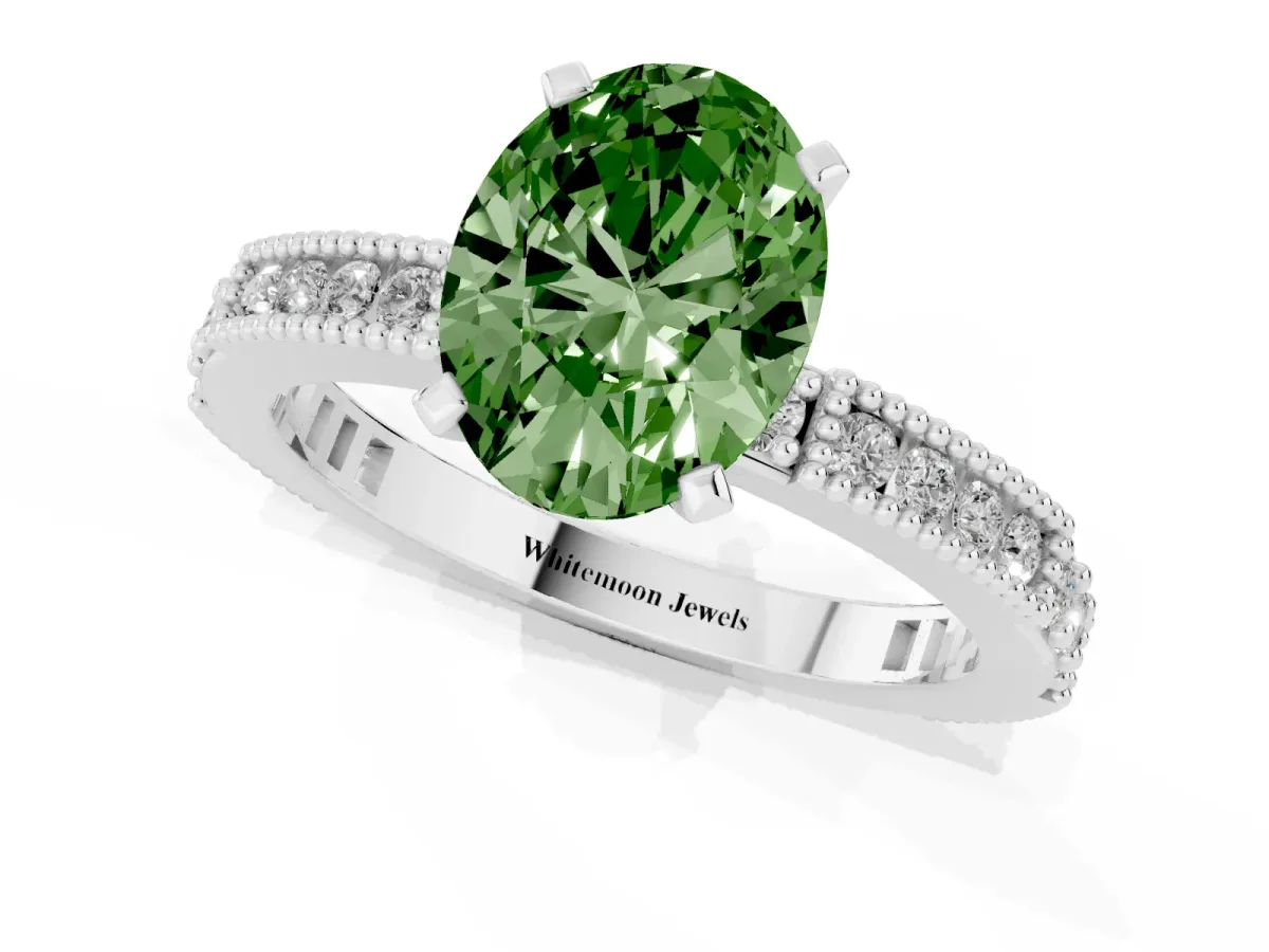Fancy Green Oval Cut Solitaire with Pavé Band and Four-Prong Setting Silver