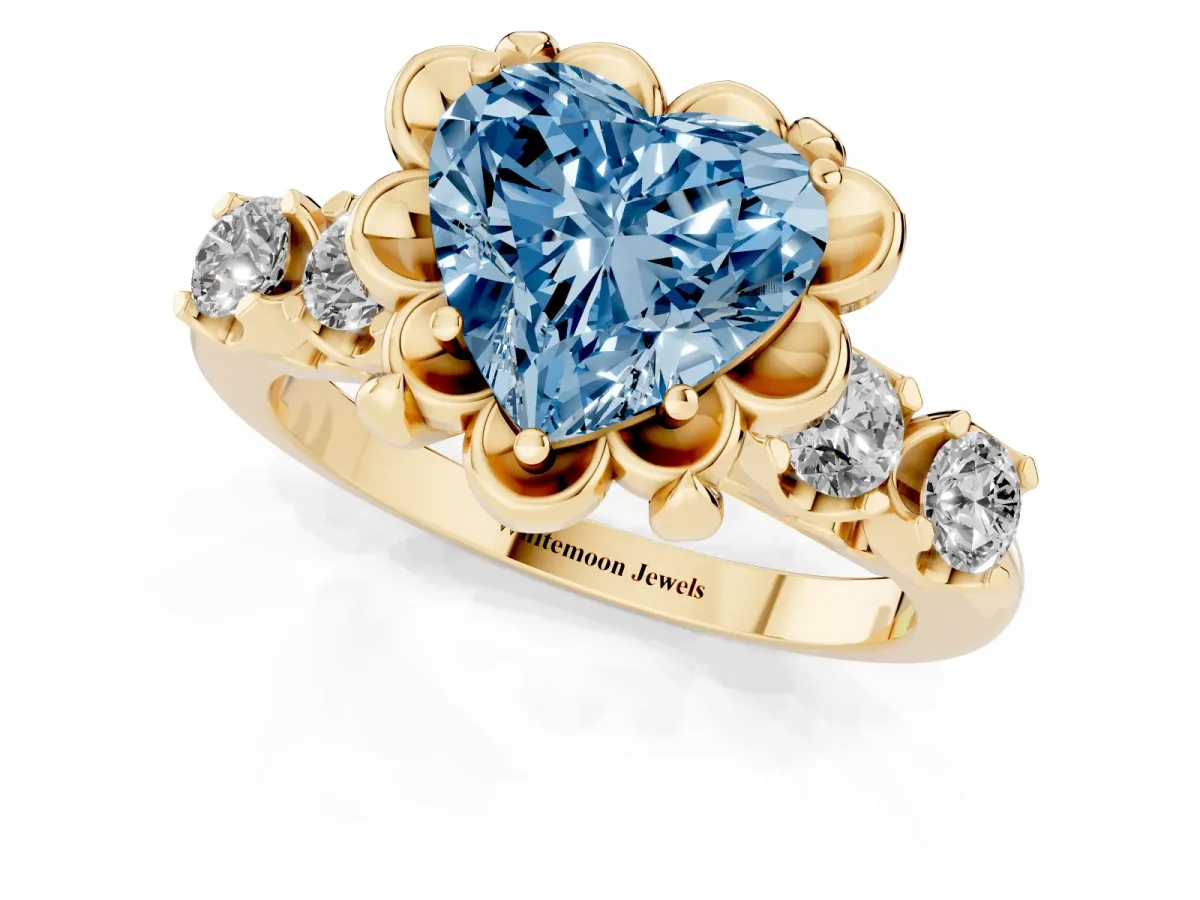 Fancy Blue Heart Cut Cut Diamond Floral Halo Engagement Ring with Shared Prong Setting Yellow gold