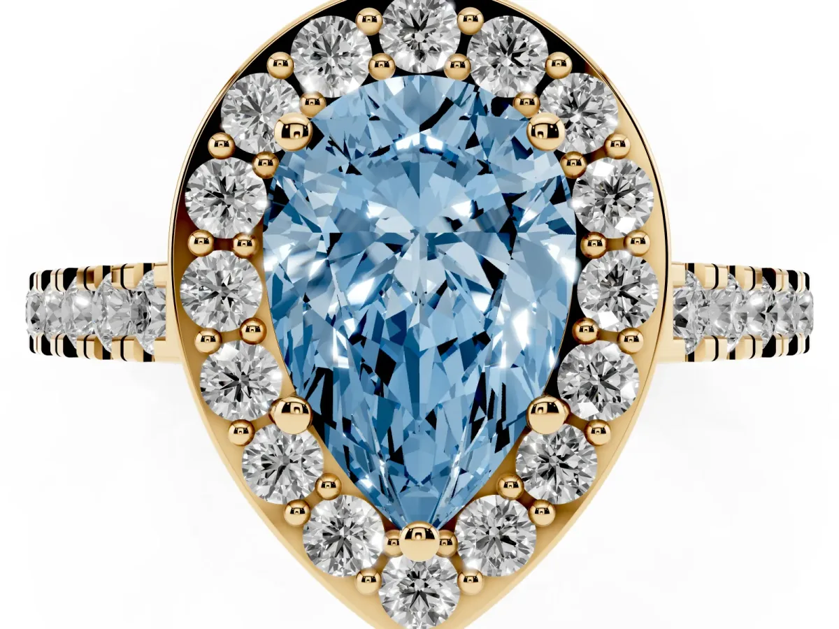 Fancy Blue Pear Cut Diamond Halo Ring with Round Pavé Split Shank and Prong Setting Yellow gold