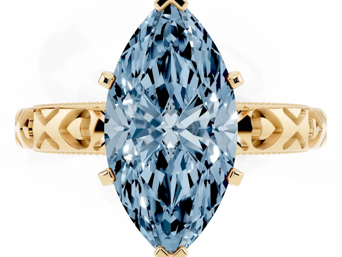 Fancy Blue Marquise Cut Solitaire Diamond Engagement Ring with XO Engraved Band and Four-Prong Setting Yellow gold