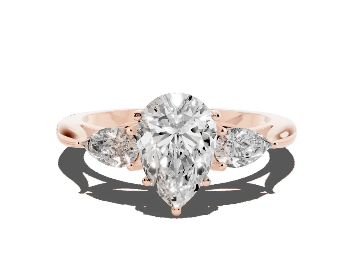 Three-Stone Pear Cut Brilliant Diamond Solitaire Ring with Tapered Band and Four-Prong Setting Rose gold