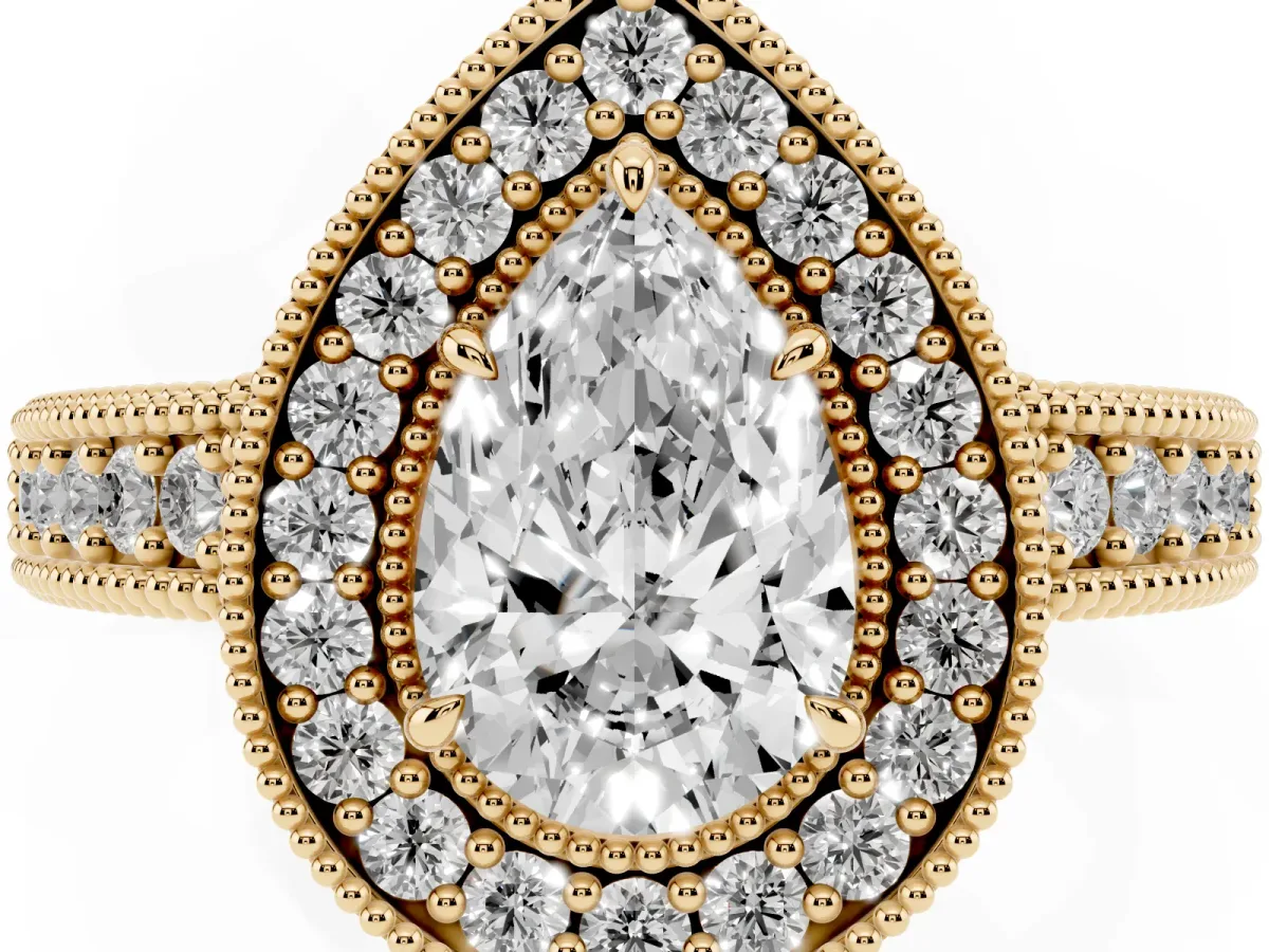 Pear Cut Cut Halo Diamond Ring with Pavé Band and Four-Prong Setting Yellow gold