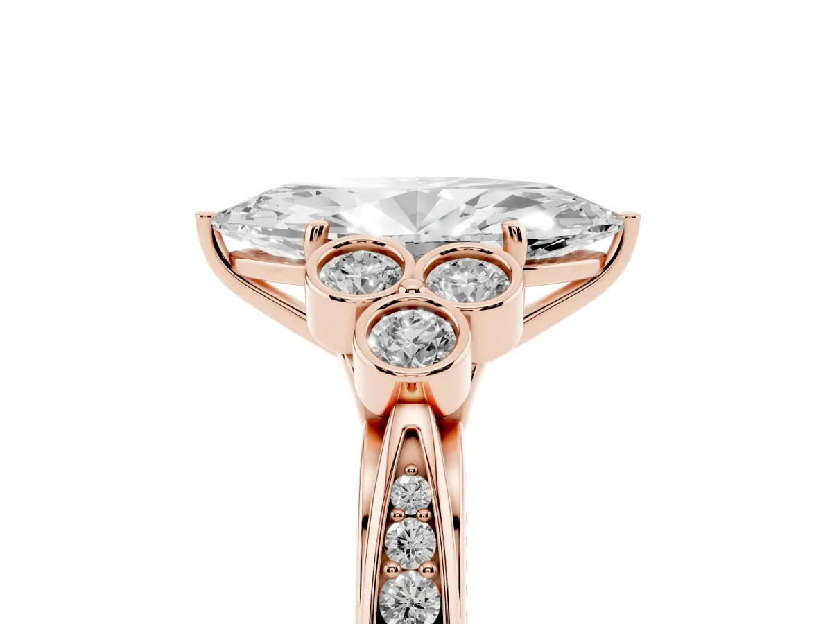 Marquise Cut Cut Diamond Engagement Ring with Bezel Set Round Side Stones and Prong Setting Rose gold