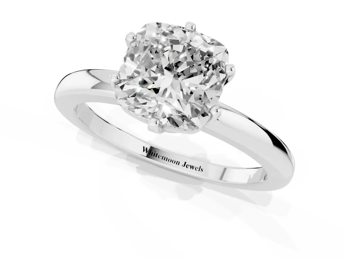 Cushion Cut Solitaire Diamond Ring with Six-Prong Setting on a Classic Band Platinum