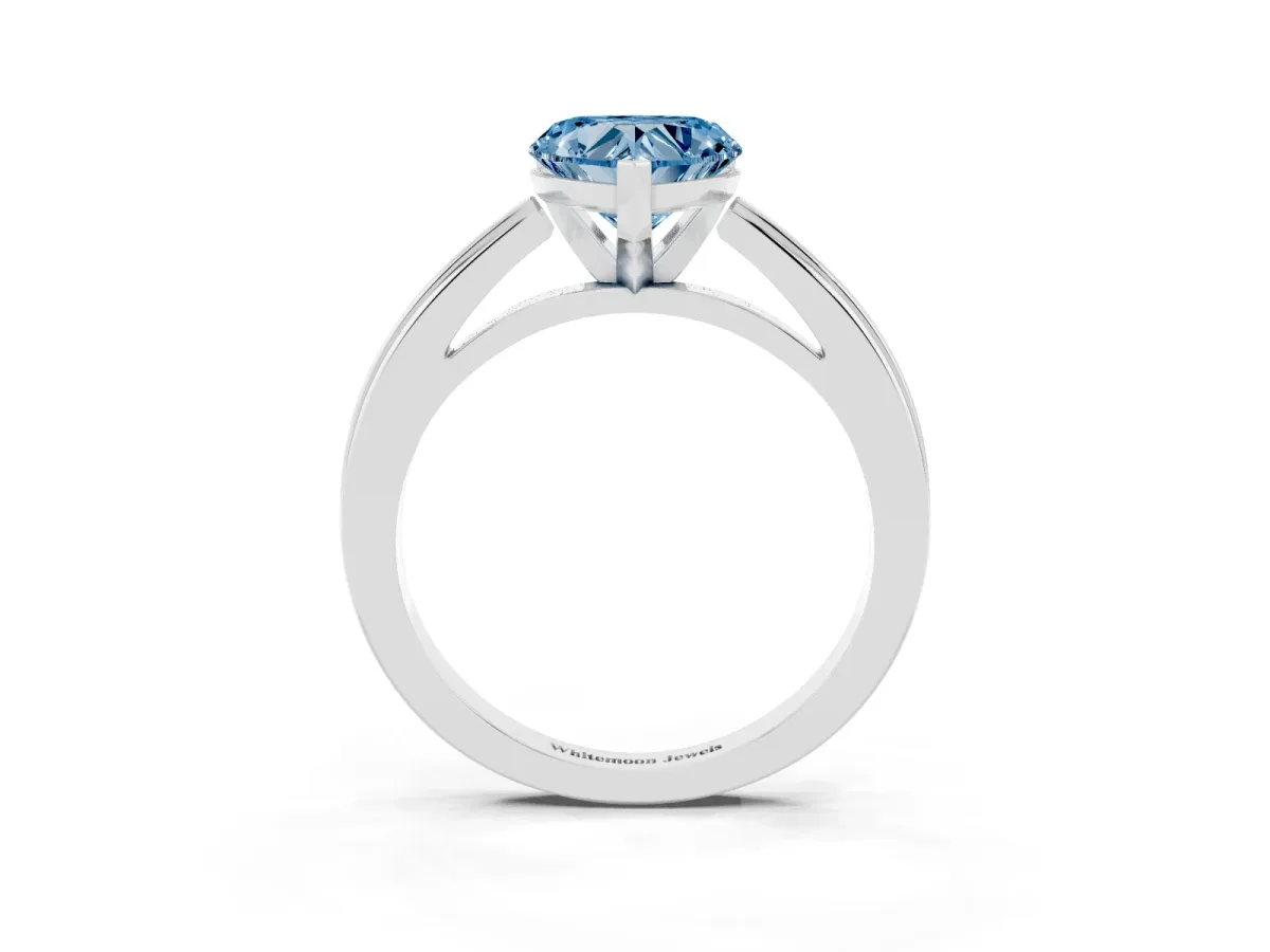 Fancy Blue Heart Cut Solitaire Diamond Ring with Four-Prong Setting and Classic Band Platinum