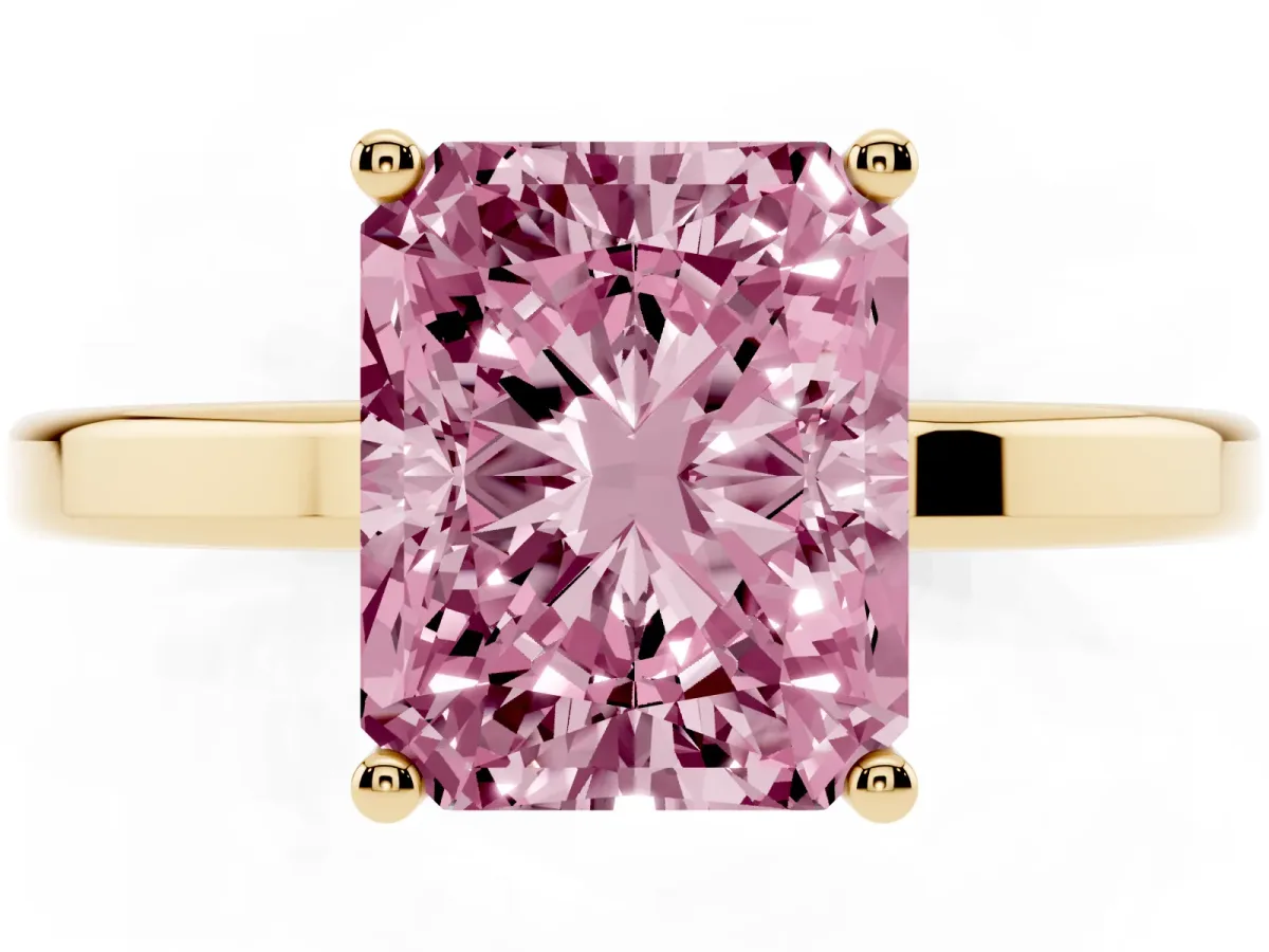 Fancy Pink Radiant Cut Cut Solitaire Engagement Ring with Four-Prong Setting on a Classic Band Yellow gold