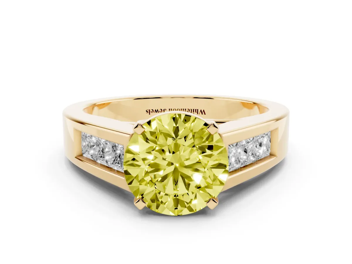 Fancy Yellow Round Cut Cut Channel Set Solitaire Ring with Four-Prong Setting Yellow gold