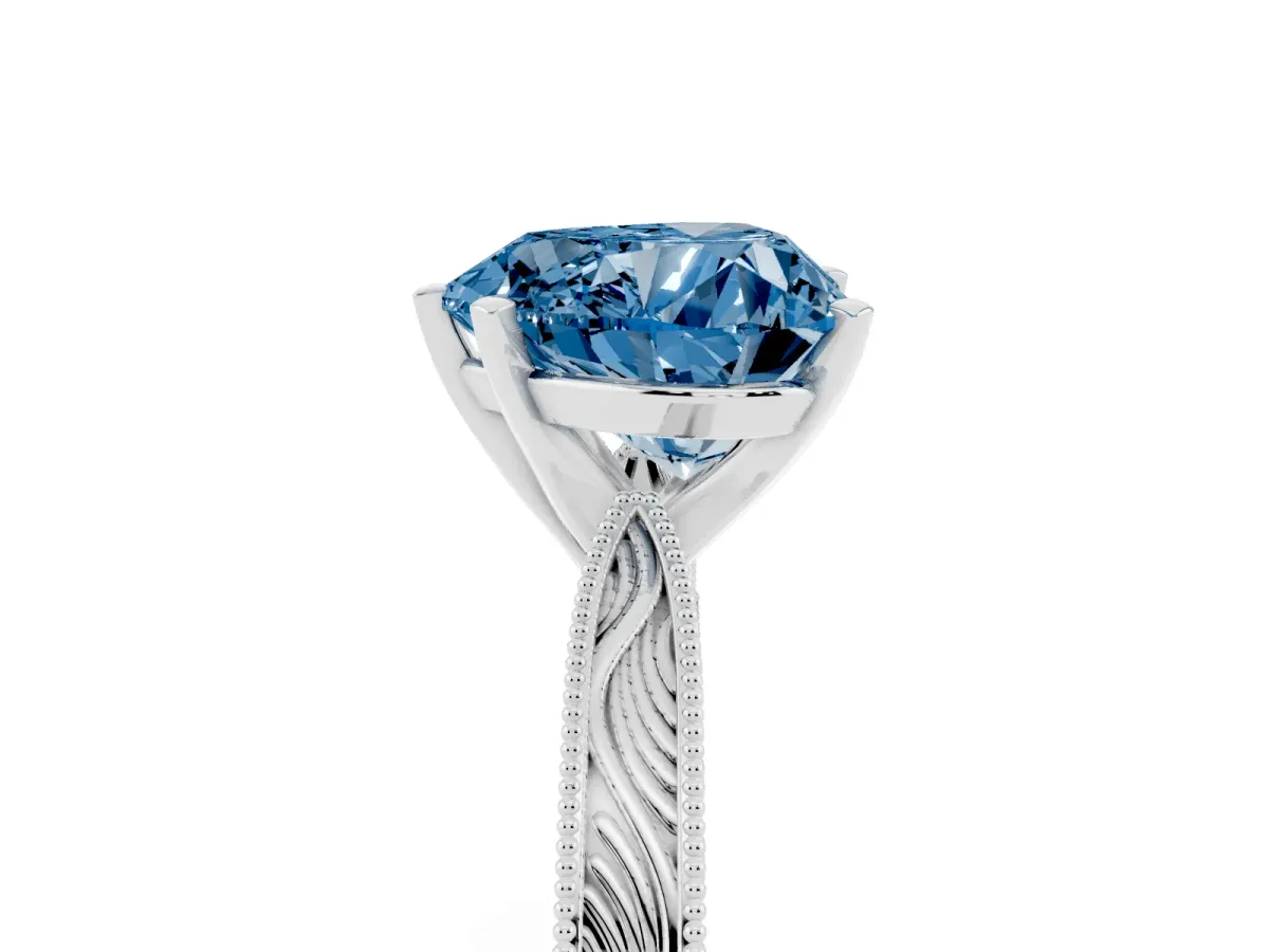 Fancy Blue Heart Cut Solitaire Milgrain Engraved Band with Four-Prong Setting Platinum