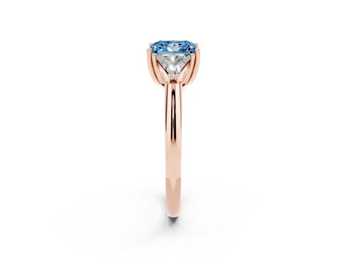 Fancy Blue Three-Stone Princess Cut Diamond Engagement Ring with Trillion Side Stones and Prong Setting Rose gold