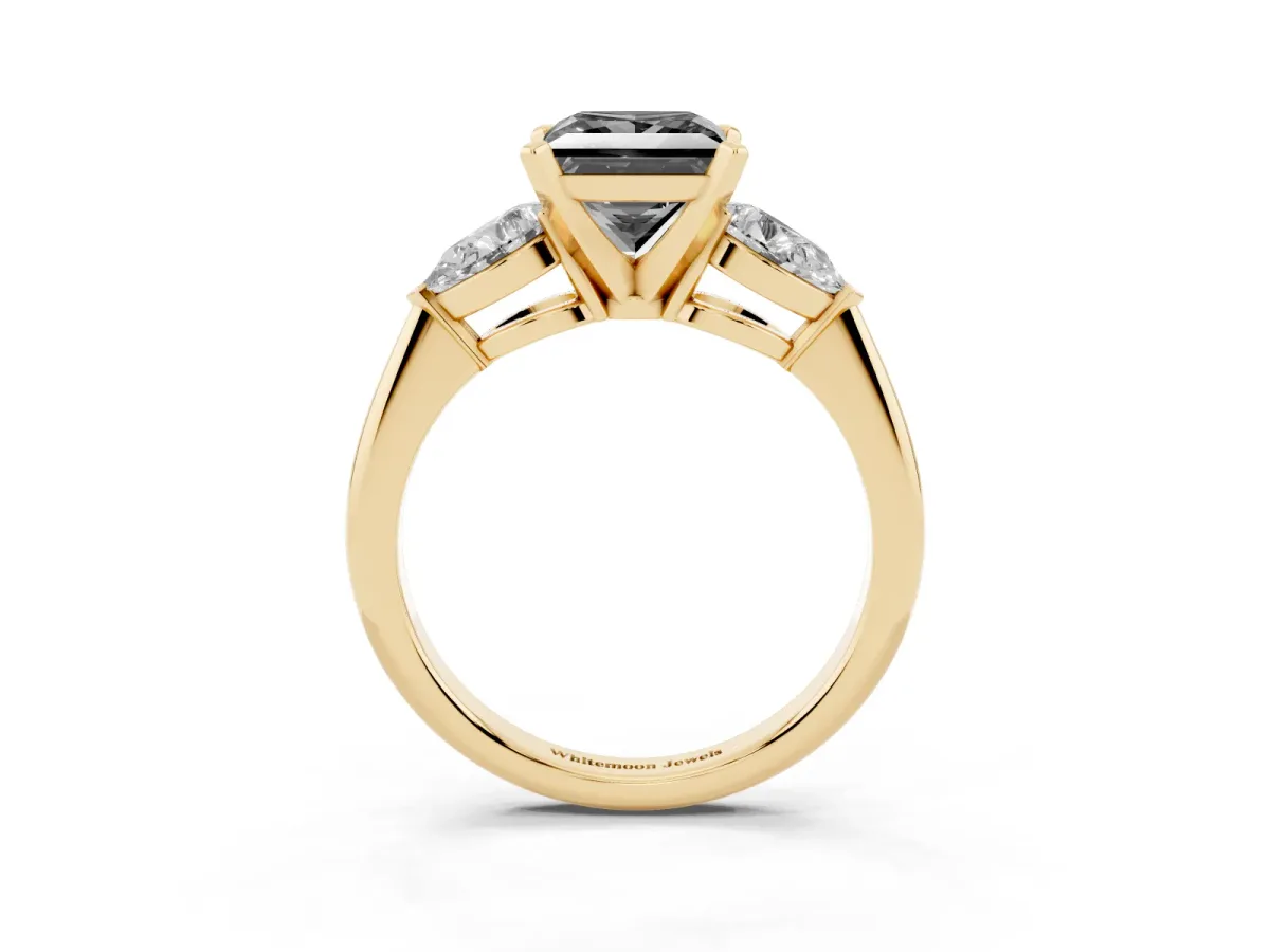 Fancy Black Three-Stone Princess Cut Diamond Ring with Pear Side Stones and Four-Prong Setting Yellow gold