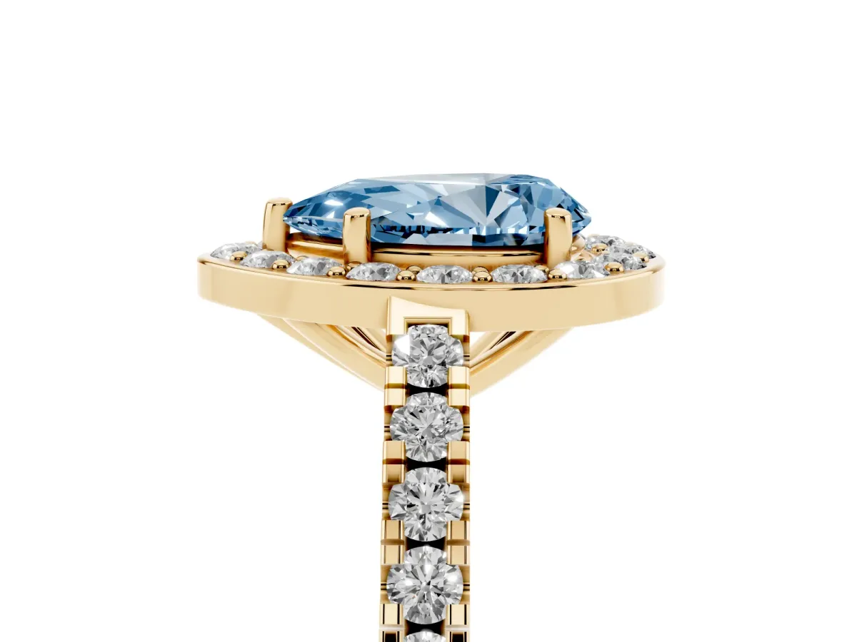 Fancy Blue Pear Cut Diamond Halo Ring with Round Pavé Split Shank and Prong Setting Yellow gold