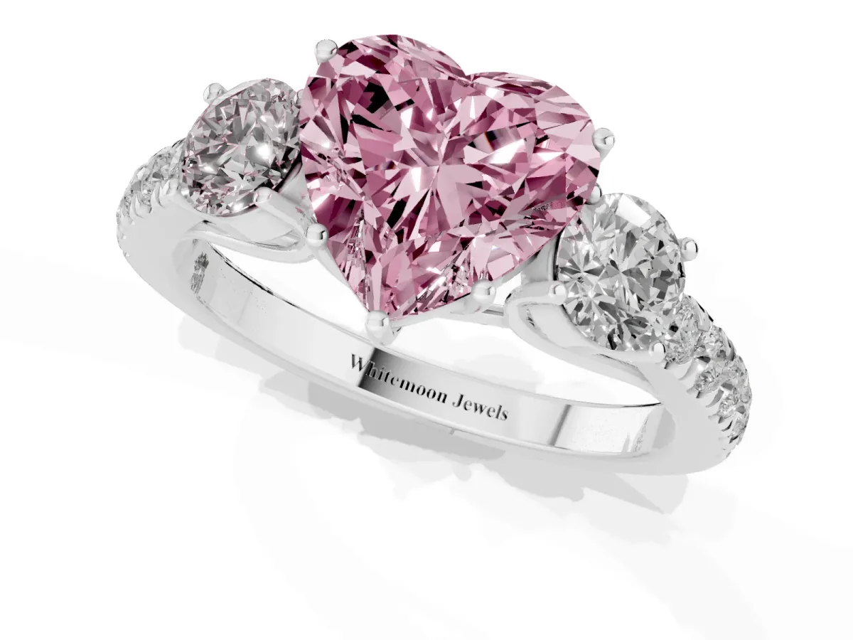 Fancy Pink Heart Cut Cut Diamond Three-Stone Ring with Round Side Stones and Pavé Band Silver