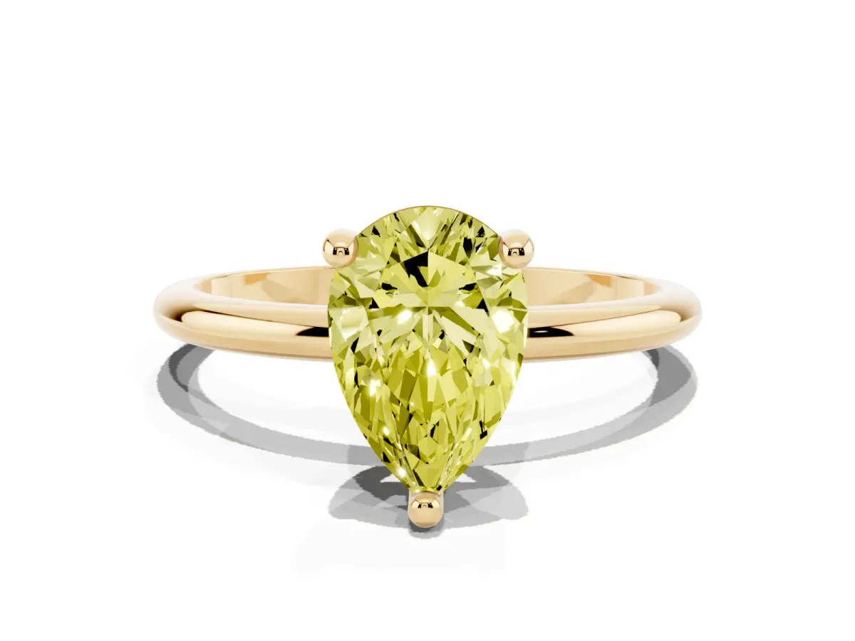 Fancy Yellow Pear Cut Solitaire Diamond Ring with 4-Prong Setting on a Classic Band Yellow gold