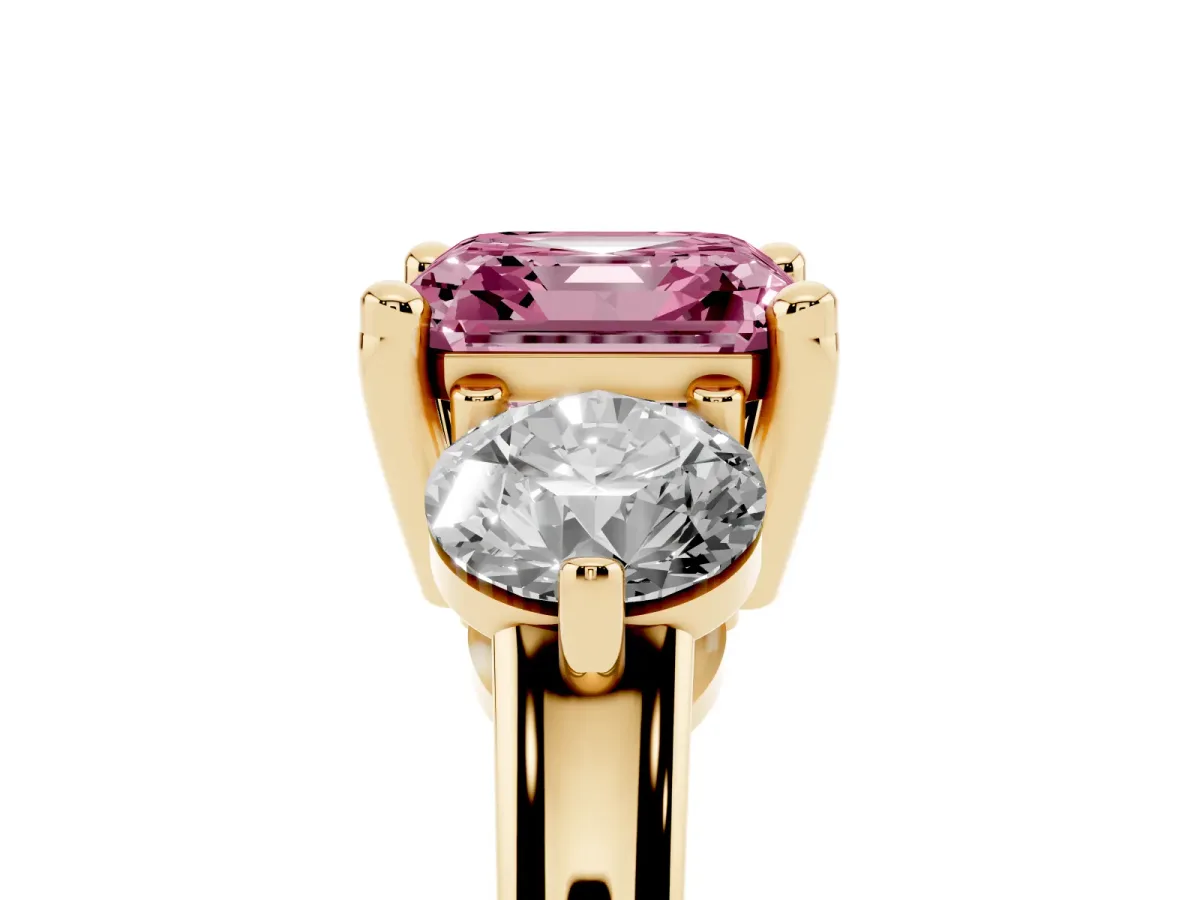 Fancy Pink Three-Stone Asscher Cut Brilliant Cut Solitaire Ring with Prong Setting on a Classic Band Yellow gold