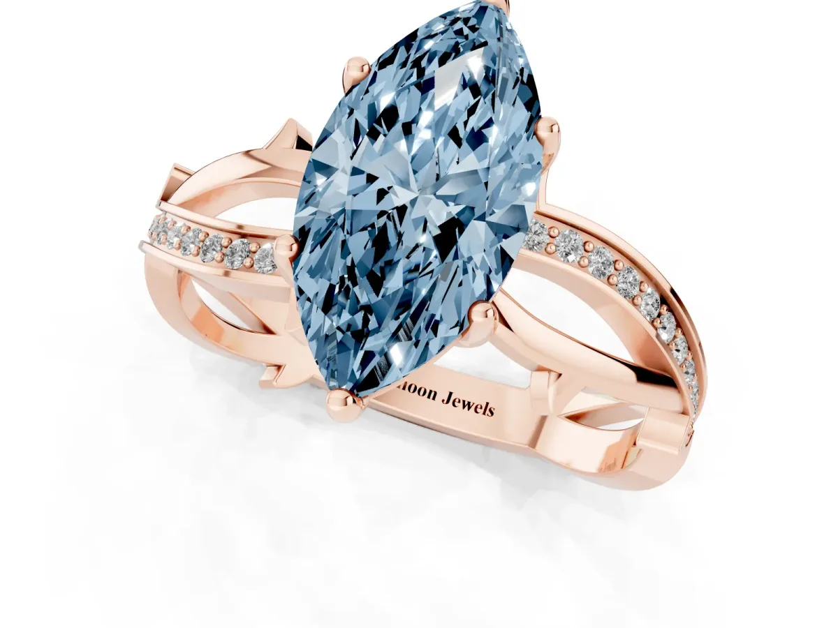 Fancy Blue Marquise Cut Solitaire Twist Band with Pavé Accents and Four-Prong Setting Rose gold
