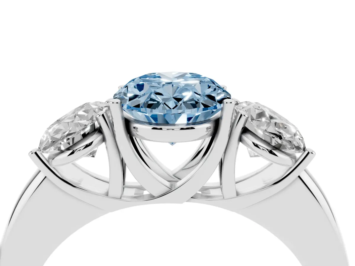 Fancy Blue Oval Cut Diamond Three-Stone Ring with Four-Prong Setting and Classic Band Platinum
