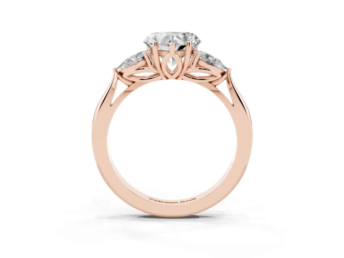 Heart Cut Diamond Three-Stone Ring with Pear Side Stones and Prong Setting Rose gold