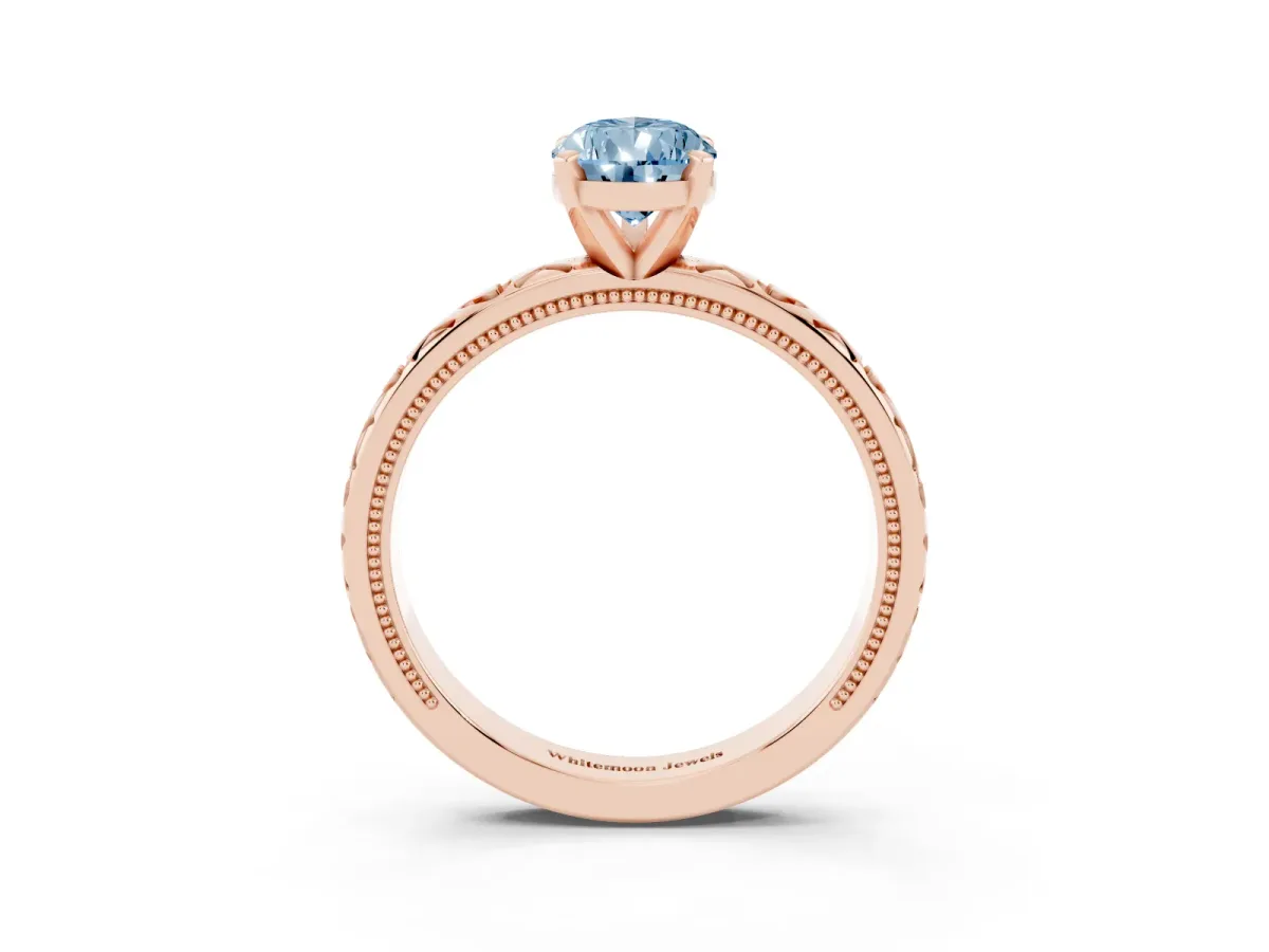 Fancy Blue Pear Cut Solitaire Diamond Engagement Ring with XO Engraved Band and Four-Prong Setting Rose gold