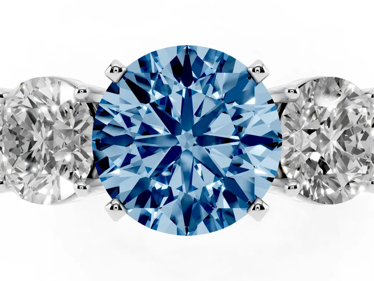 Fancy Blue Three-Stone Round Cut Diamond Ring with Round Side Stones, Classic Band, and Four-Prong Setting White gold