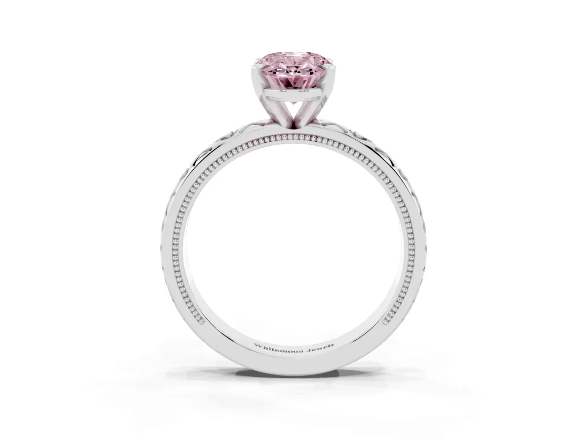 Fancy Pink Oval Cut Solitaire Diamond Engagement Ring with XO Engraved Band and Four-Prong Setting Platinum