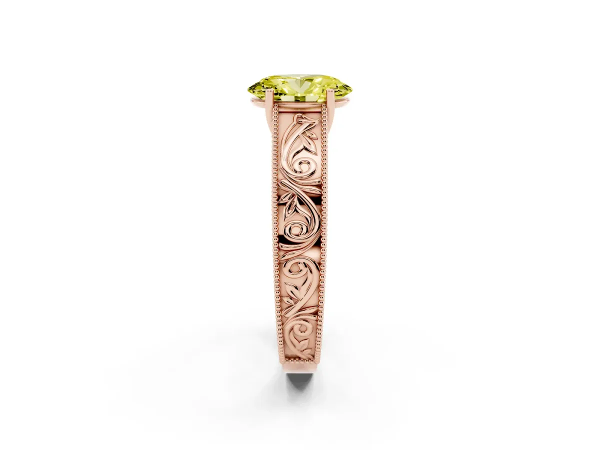 Fancy Yellow Oval Cut Diamond Solitaire Ring with Engraved Band and Four-Prong Setting Rose gold