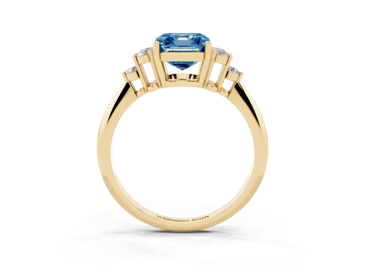 Fancy Blue Asscher Cut Cut Diamond Cluster Ring with Solitaire Band and Four-Prong Setting Yellow gold