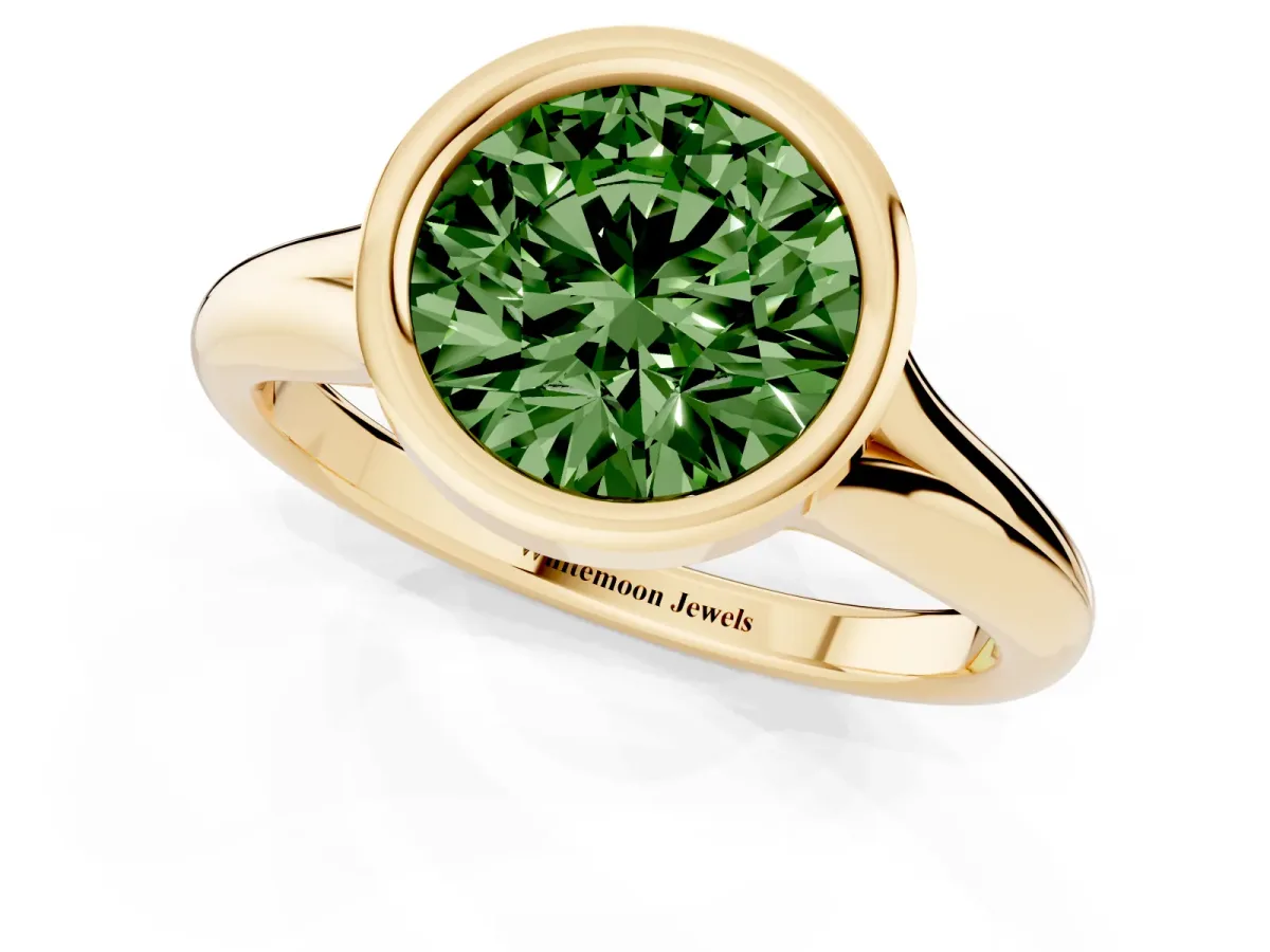 Fancy Green Bezel Set Round Cut Solitaire Diamond Ring with Smooth Band Yellow gold