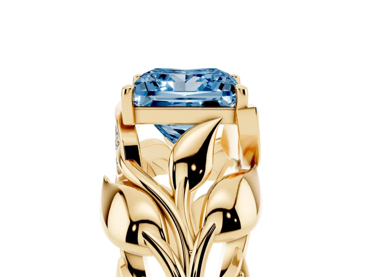 Fancy Blue Princess Cut Diamond Leaf-Inspired Engagement Ring with Round Accents and Prong Setting Yellow gold