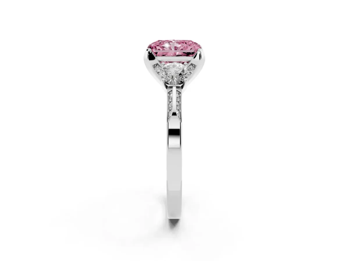 Fancy Pink Radiant Cut Brilliant Three-Stone Diamond Ring with Pavé Band and Four-Prong Setting White gold