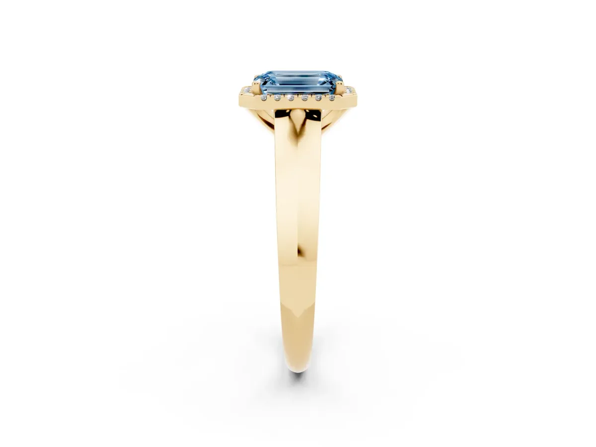 Fancy Blue Emerald Cut Halo Diamond Ring with Cathedral Band and Four-Prong Setting Yellow gold