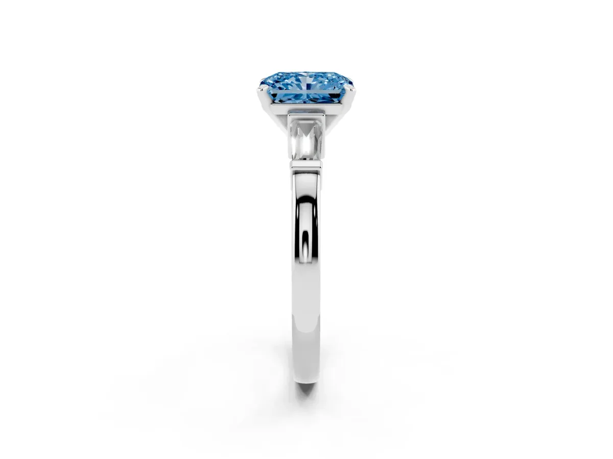 Fancy Blue Radiant Cut Cut Diamond Solitaire Ring with Tapered Baguette Accents and Four-Prong Setting Silver