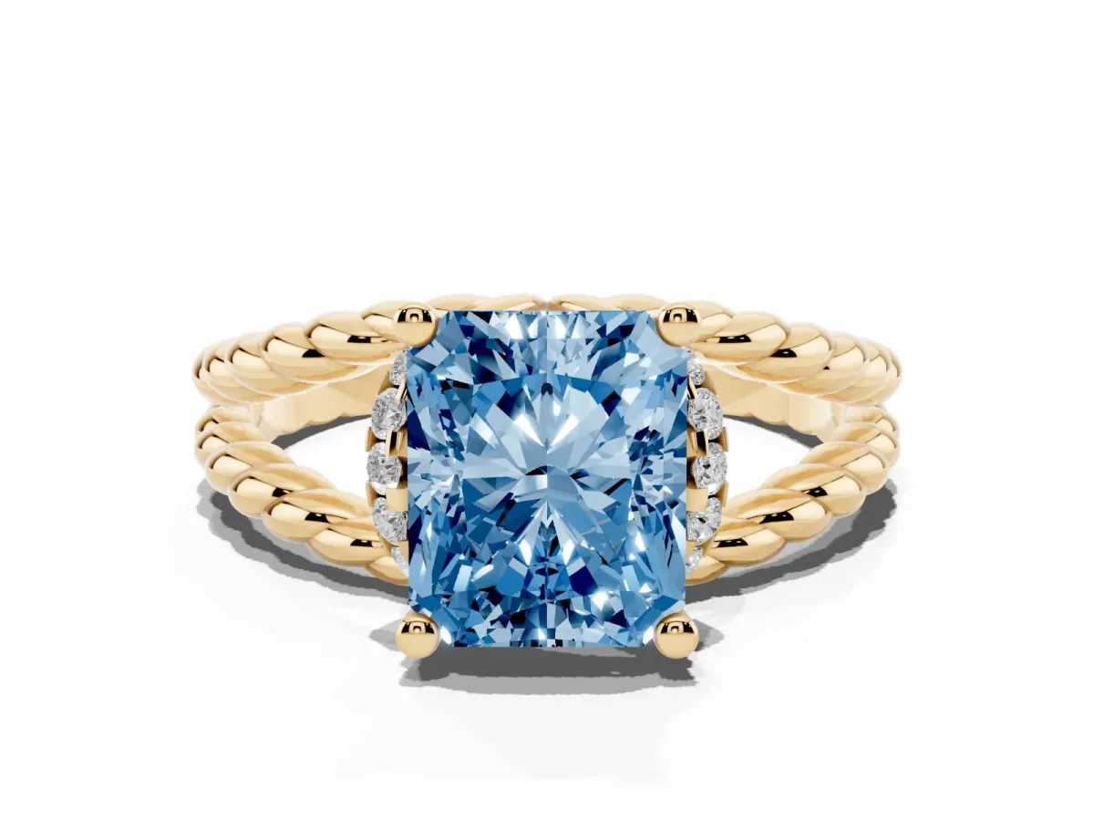 Fancy Blue Radiant Cut Halo Twisted Band Four-Prong Ring Yellow gold