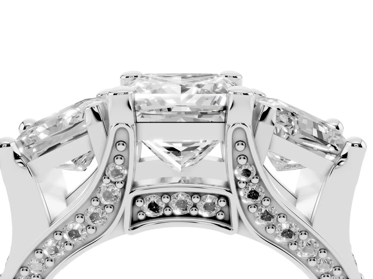 Princess Cut Diamond Three-Stone Ring with Channel Set Band and Four-Prong Setting Silver